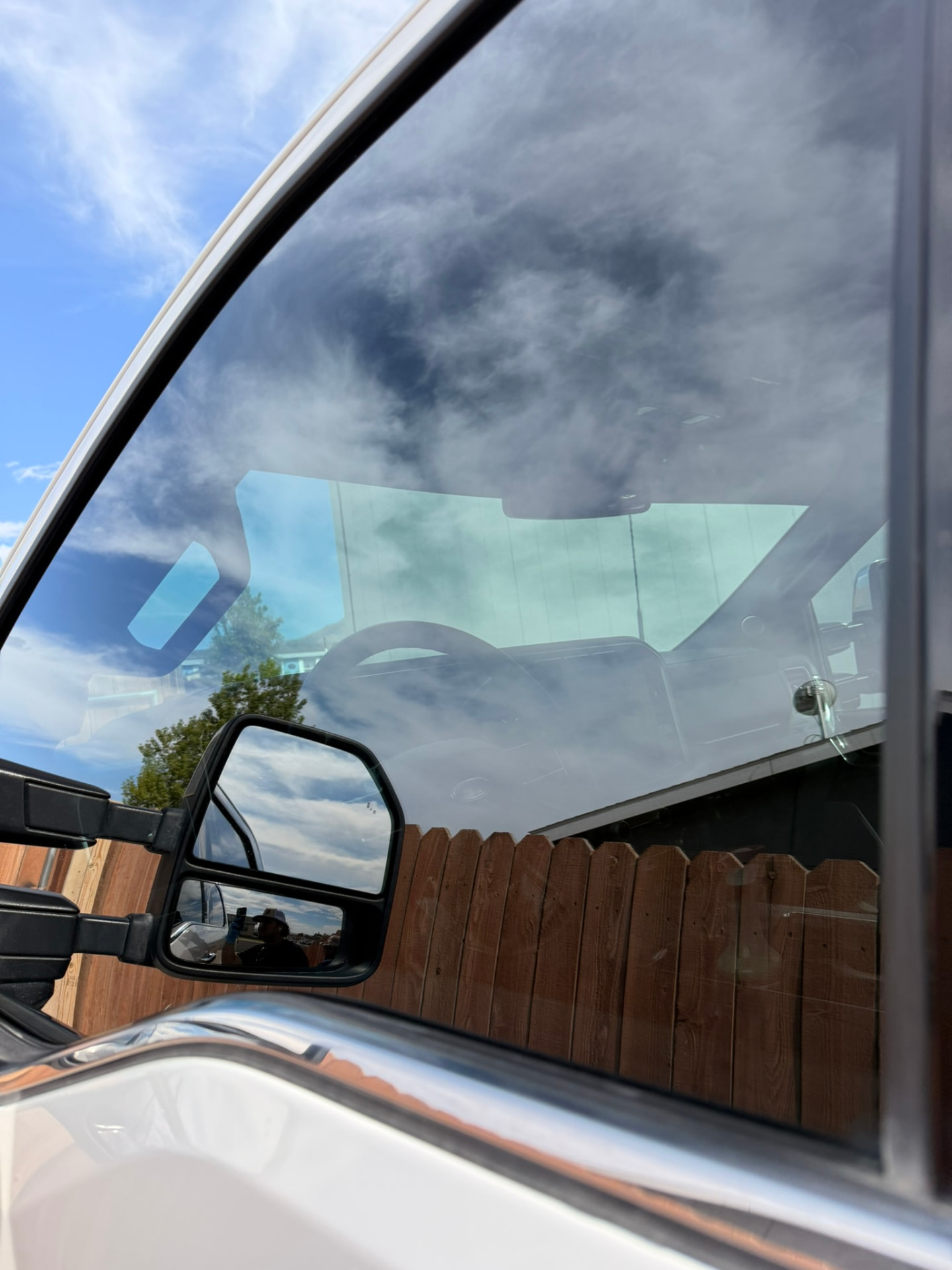White truck — side mirror reflection